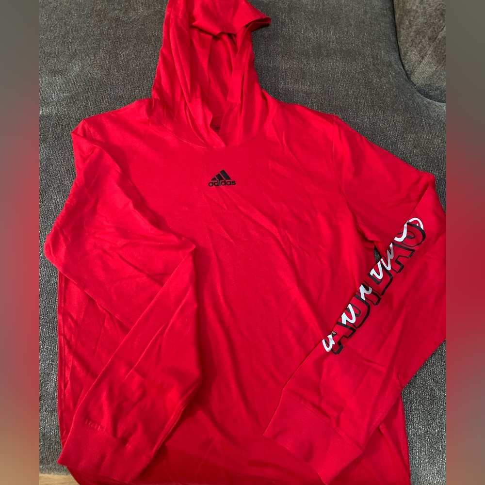 Adidas long sleeved hooded shirt.